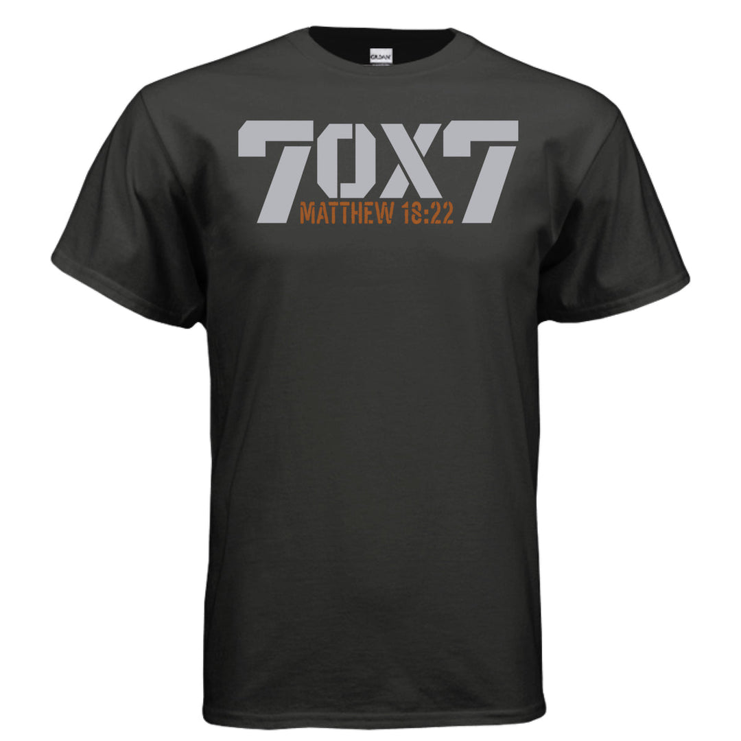 Black Christian t-shirt with bold gray text reading '70 x 7' and scripture reference 'Matthew 18:22' in orange beneath it