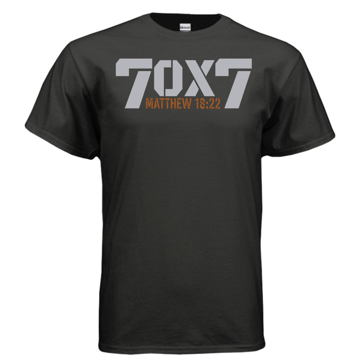 Black Christian t-shirt with bold gray text reading '70 x 7' and scripture reference 'Matthew 18:22' in orange beneath it