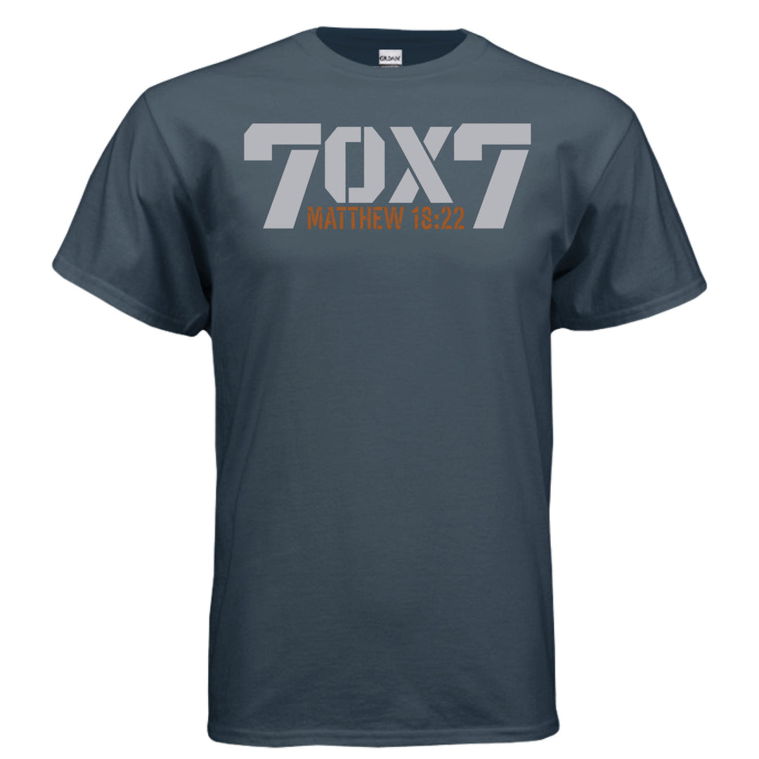 Blue dusk Christian t-shirt with bold gray text reading '70 x 7' and scripture reference 'Matthew 18:22' in orange beneath it