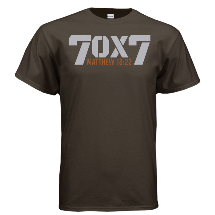 Dark brown Christian t-shirt with bold gray text reading '70 x 7' and scripture reference 'Matthew 18:22' in orange beneath it