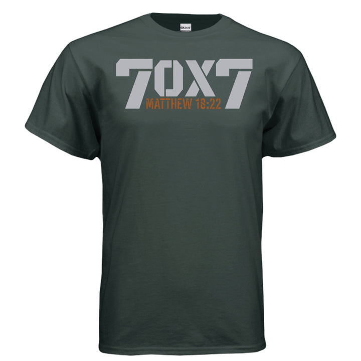 Forest green Christian t-shirt with bold gray text reading '70 x 7' and scripture reference 'Matthew 18:22' in orange beneath it