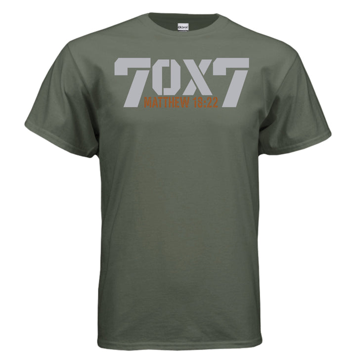 Military green Christian t-shirt with bold gray text reading '70 x 7' and scripture reference 'Matthew 18:22' in orange beneath it