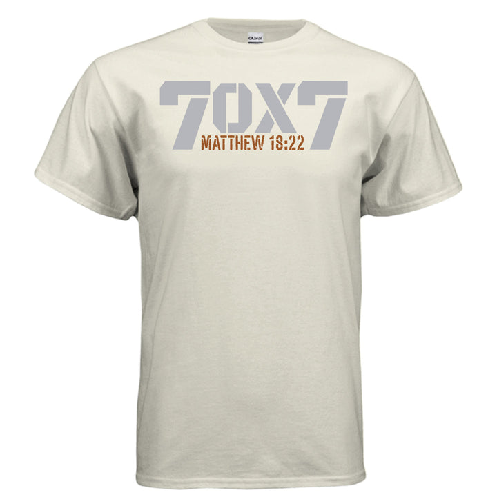 Natural Christian t-shirt with bold gray text reading '70 x 7' and scripture reference 'Matthew 18:22' in orange beneath it