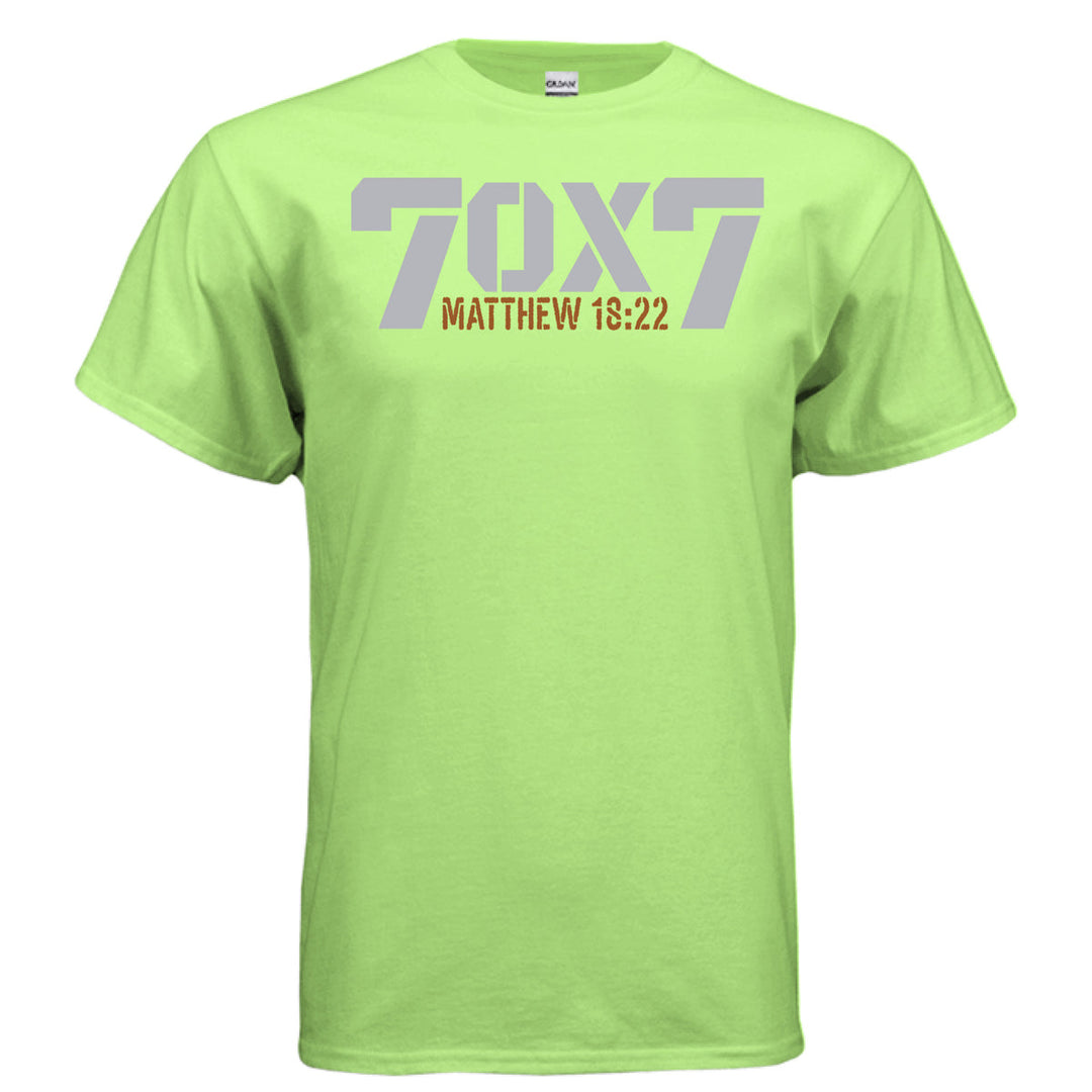 Neon green Christian t-shirt with bold gray text reading '70 x 7' and scripture reference 'Matthew 18:22' in orange beneath it