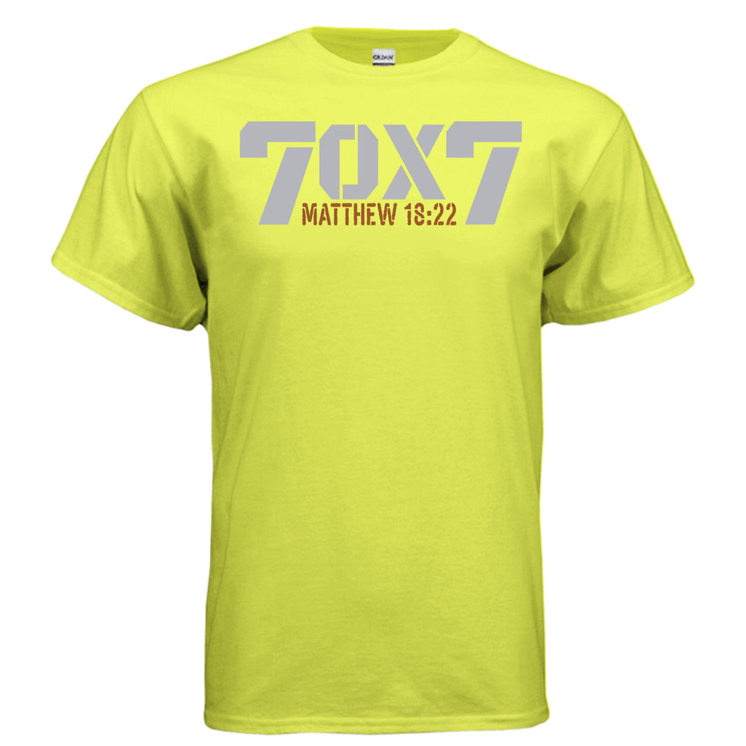 Safety green Christian t-shirt with bold gray text reading '70 x 7' and scripture reference 'Matthew 18:22' in orange beneath it