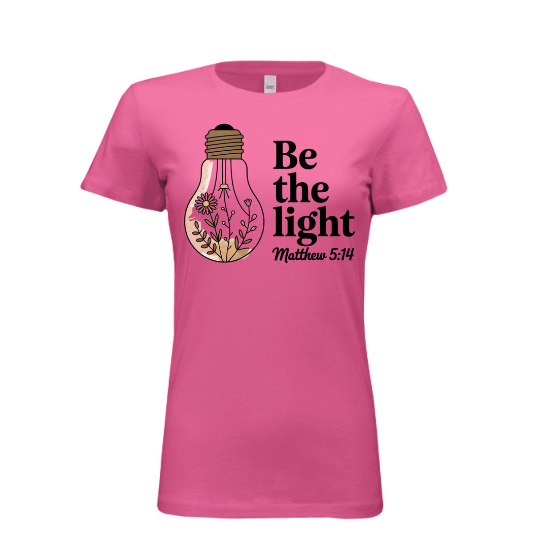 Women's fitted tee in berry with a floral light bulb graphic and the words “Be the light – Matthew 5:14” in bold and script fonts.