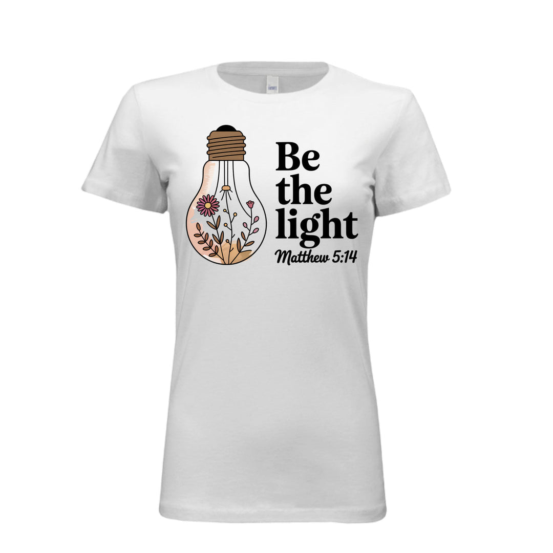 Women's fitted tee in white with a floral light bulb graphic and the words “Be the light – Matthew 5:14” in bold and script fonts.