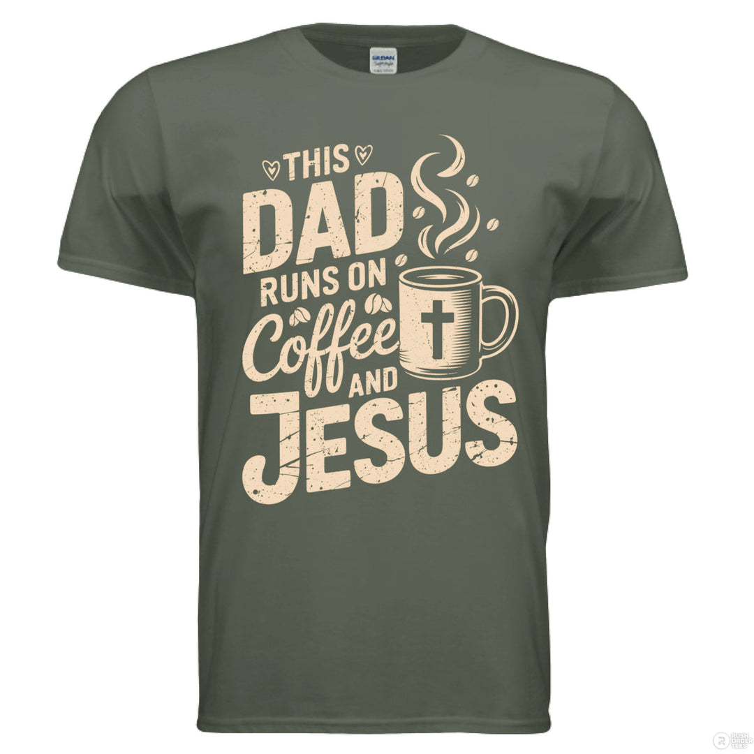 Military green Christian t-shirt with bold beige text reading ‘This Dad Runs on Coffee and Jesus’ and a steaming mug with a cross graphic