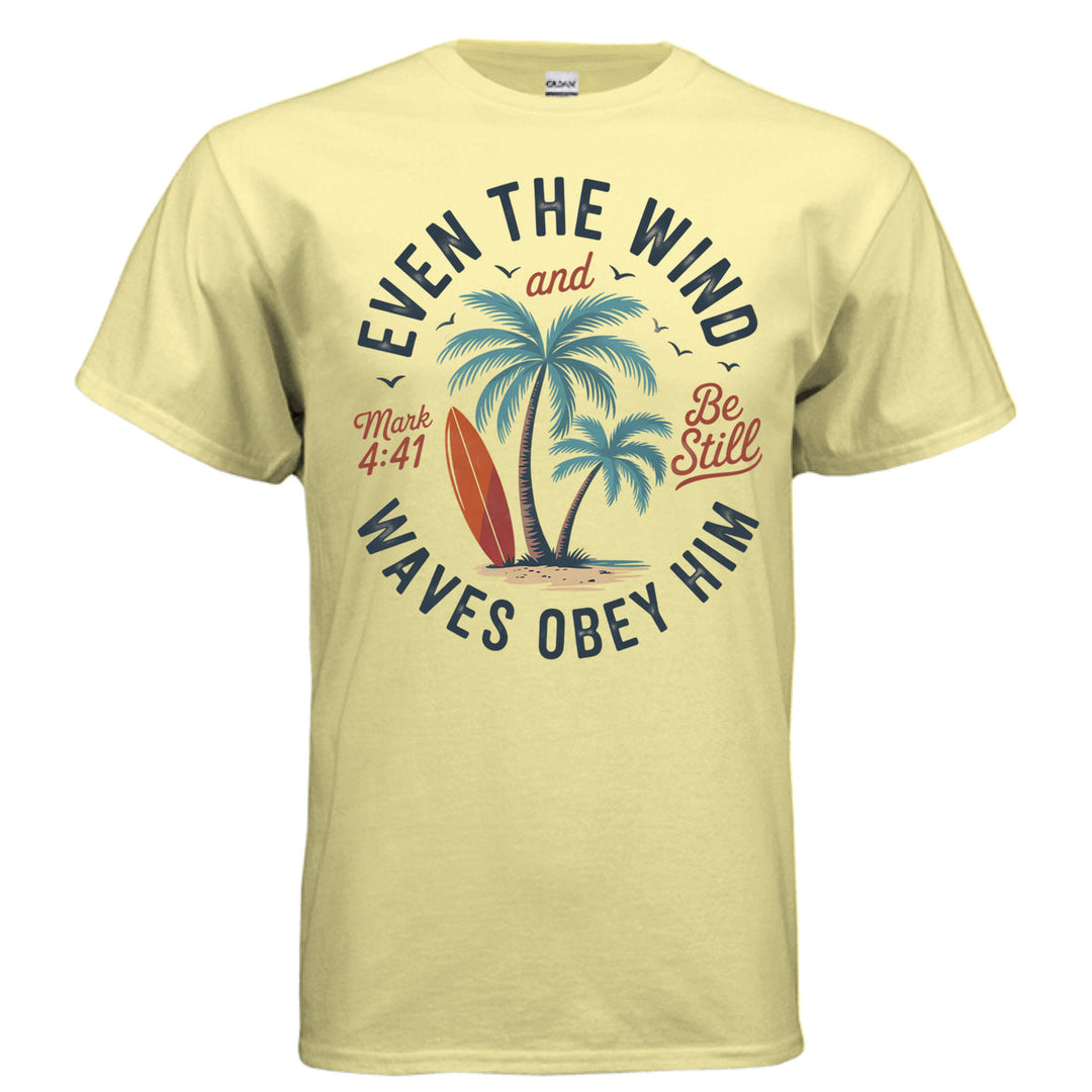 Cornsilk Christian t-shirt with palm trees, a red surfboard, and the words ‘Even the wind and waves obey Him – Mark 4:41’ and ‘Be Still’