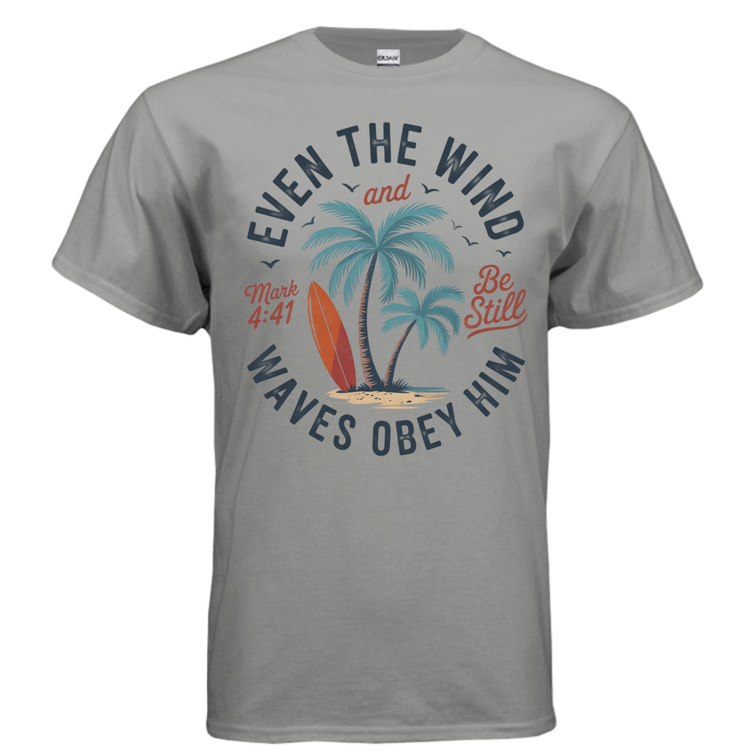 Gravel Christian t-shirt with palm trees, a red surfboard, and the words ‘Even the wind and waves obey Him – Mark 4:41’ and ‘Be Still’