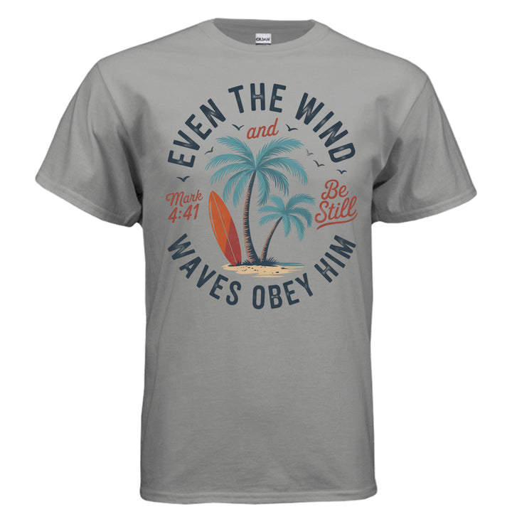 Gravel Christian t-shirt with palm trees, a red surfboard, and the words ‘Even the wind and waves obey Him – Mark 4:41’ and ‘Be Still’
