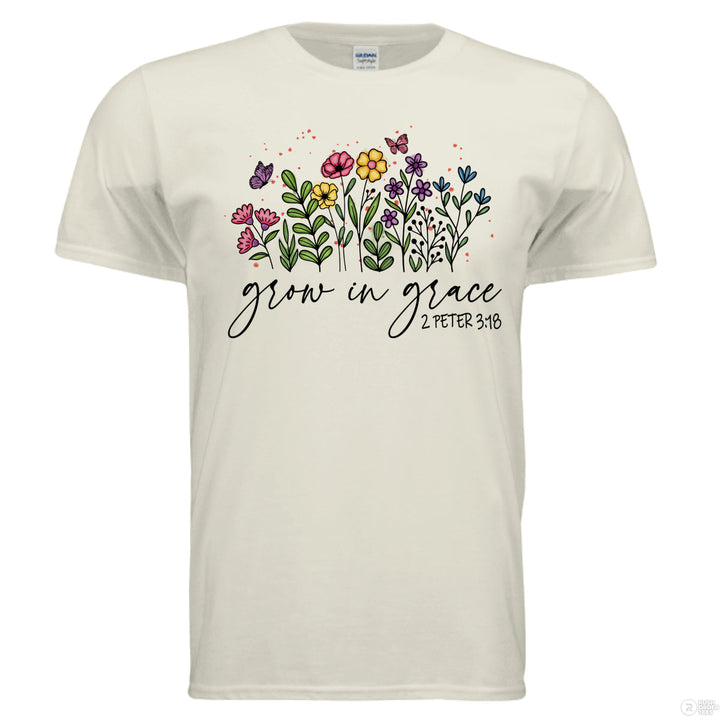 Natural shirt featuring hand-drawn colorful flowers and butterflies, with “Grow in Grace” and 2 Peter 3:18 written in script across the front.
