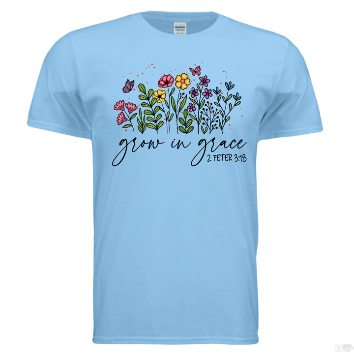 Sky shirt featuring hand-drawn colorful flowers and butterflies, with “Grow in Grace” and 2 Peter 3:18 written in script across the front.