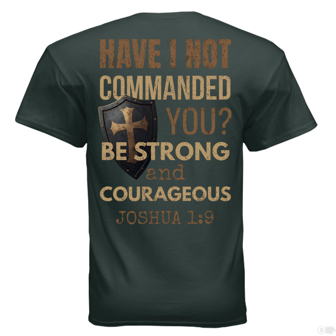 Forest green Christian t-shirt with shield and cross graphic on the front pocket and full back text from Joshua 1:9 reading ‘Be strong and courageous’