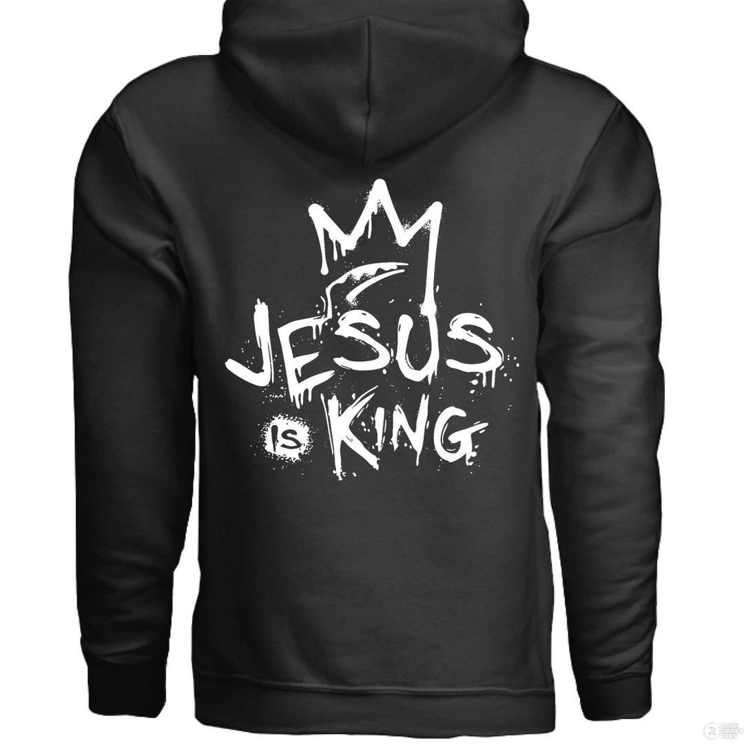 Black Christian hoodie with front spray-paint cross and bold back graffiti-style text reading ‘Jesus is King’ with crown design