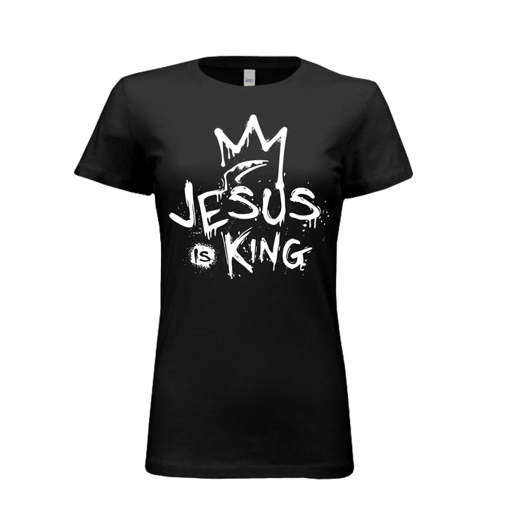 Black women’s fitted t-shirt with bold white graffiti-style design reading “Jesus Is King” under a crown. Urban faith statement piece.