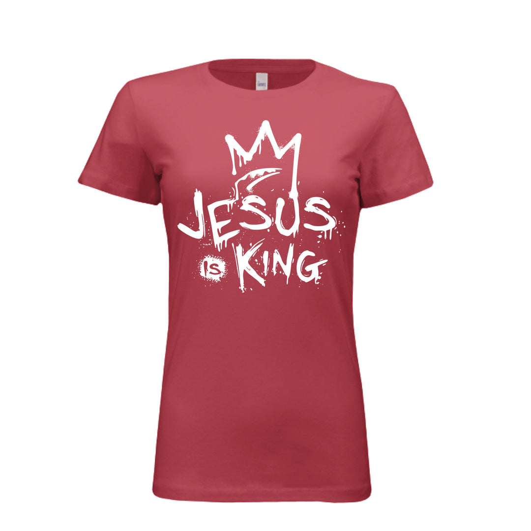 Cardinal women’s fitted t-shirt with bold white graffiti-style design reading “Jesus Is King” under a crown. Urban faith statement piece.