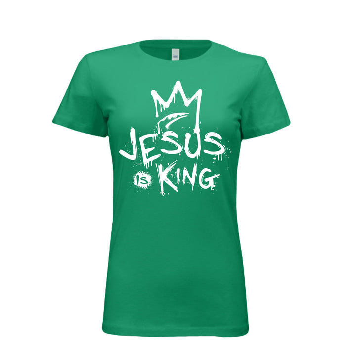Kelly women’s fitted t-shirt with bold white graffiti-style design reading “Jesus Is King” under a crown. Urban faith statement piece.