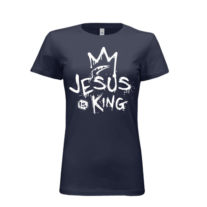 Navy women’s fitted t-shirt with bold white graffiti-style design reading “Jesus Is King” under a crown. Urban faith statement piece.
