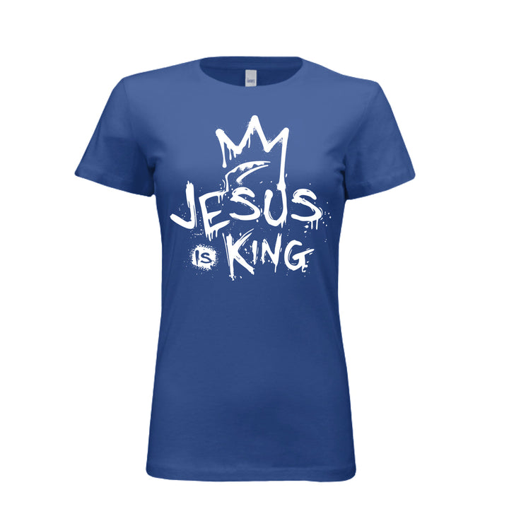 True royal women’s fitted t-shirt with bold white graffiti-style design reading “Jesus Is King” under a crown. Urban faith statement piece.