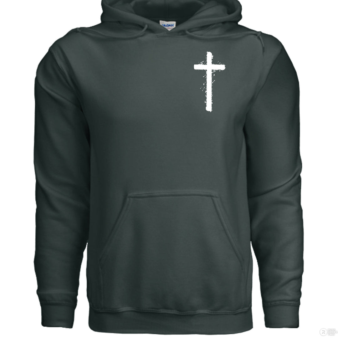 Forest green Christian hoodie with front spray-paint cross and bold back graffiti-style text reading ‘Jesus is King’ with crown design
