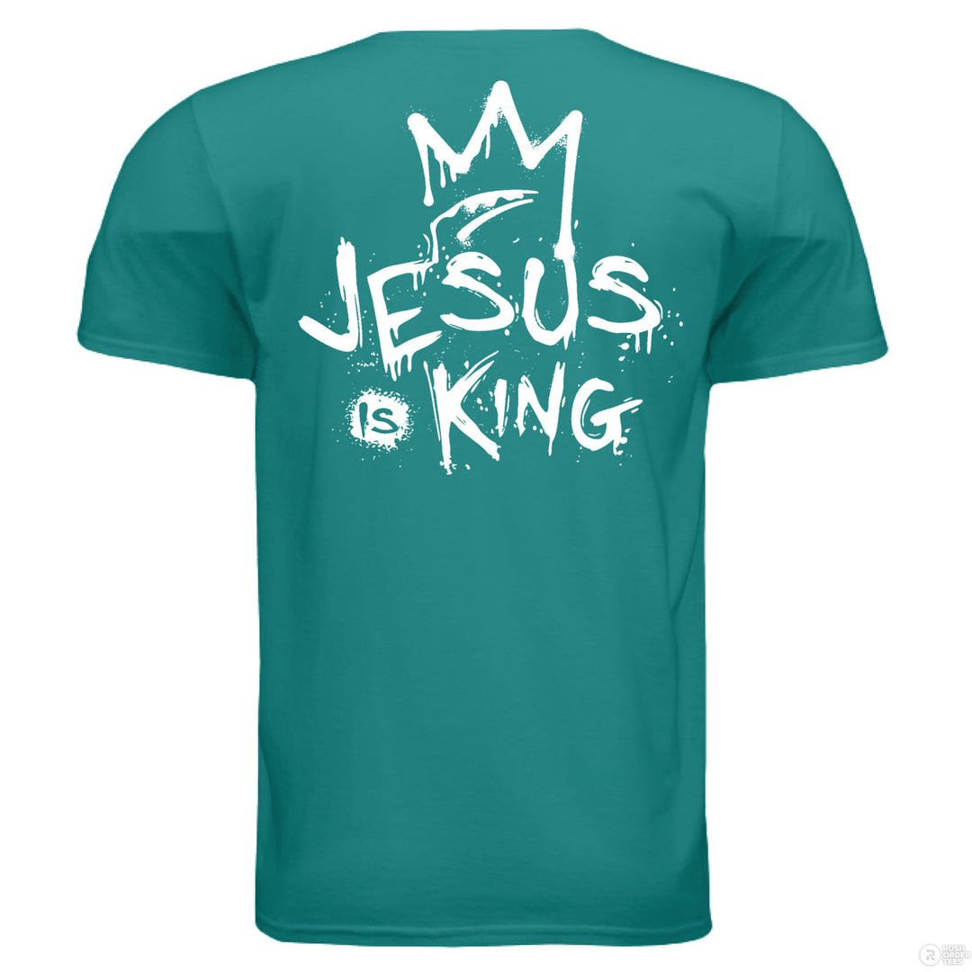 Jade dome Christian t-shirt with front spray-paint cross and bold back graffiti-style text reading ‘Jesus is King’ with crown design