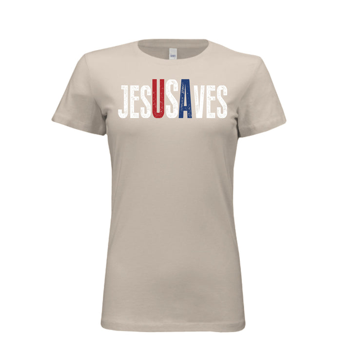 Women's cream tee with distressed white "Jesus Saves" text, highlighting "USA" in bold red, white, and blue—perfect for faith and patriotism combined.