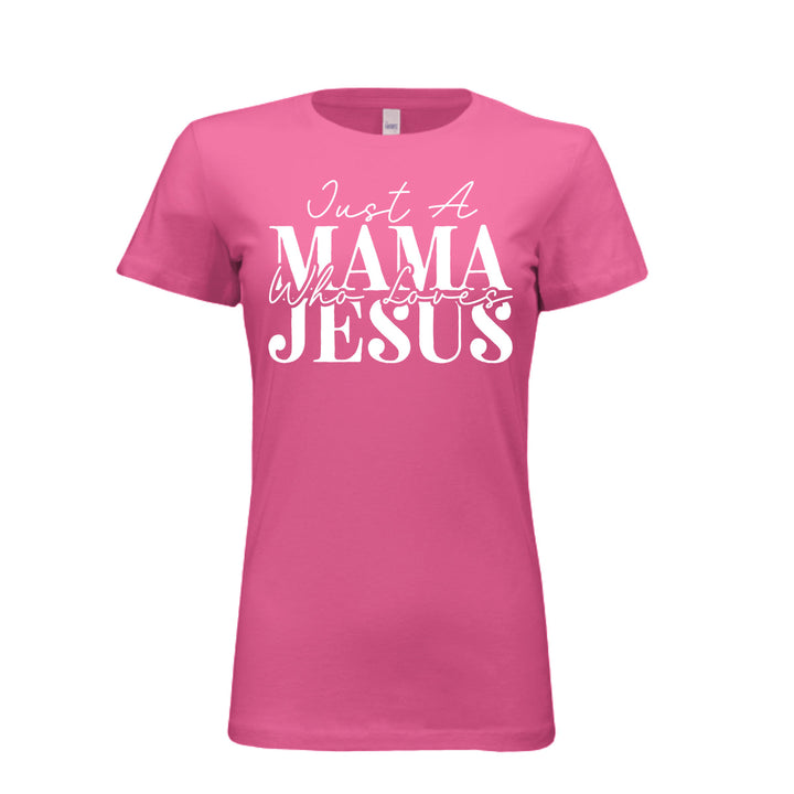 Women's berry pink t-shirt with white text reading "Just A Mama Who Loves Jesus" in bold and script fonts—a bold statement of faith and motherhood.