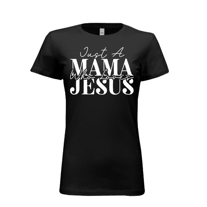 Women's black t-shirt with white text reading "Just A Mama Who Loves Jesus" in bold and script fonts—a bold statement of faith and motherhood.