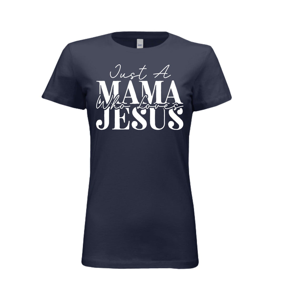 Women's navy blue t-shirt with white text reading "Just A Mama Who Loves Jesus" in bold and script fonts—a bold statement of faith and motherhood.
