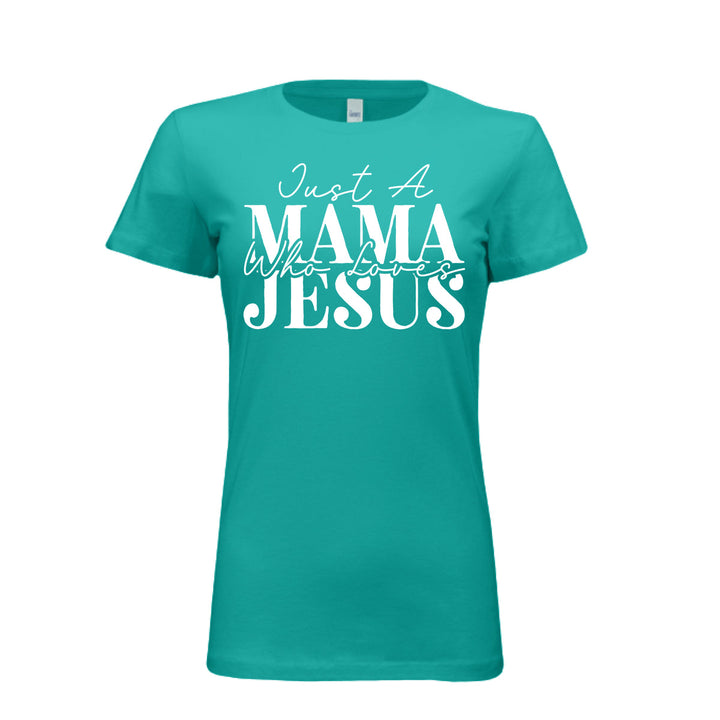 Women's teal t-shirt with white text reading "Just A Mama Who Loves Jesus" in bold and script fonts—a bold statement of faith and motherhood.