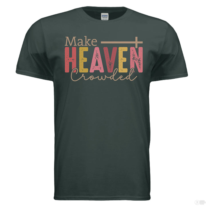 Forest green Christian t-shirt with “Make Heaven Crowded” in pink, gold, and tan lettering, featuring a cross integrated above the word HEAVEN