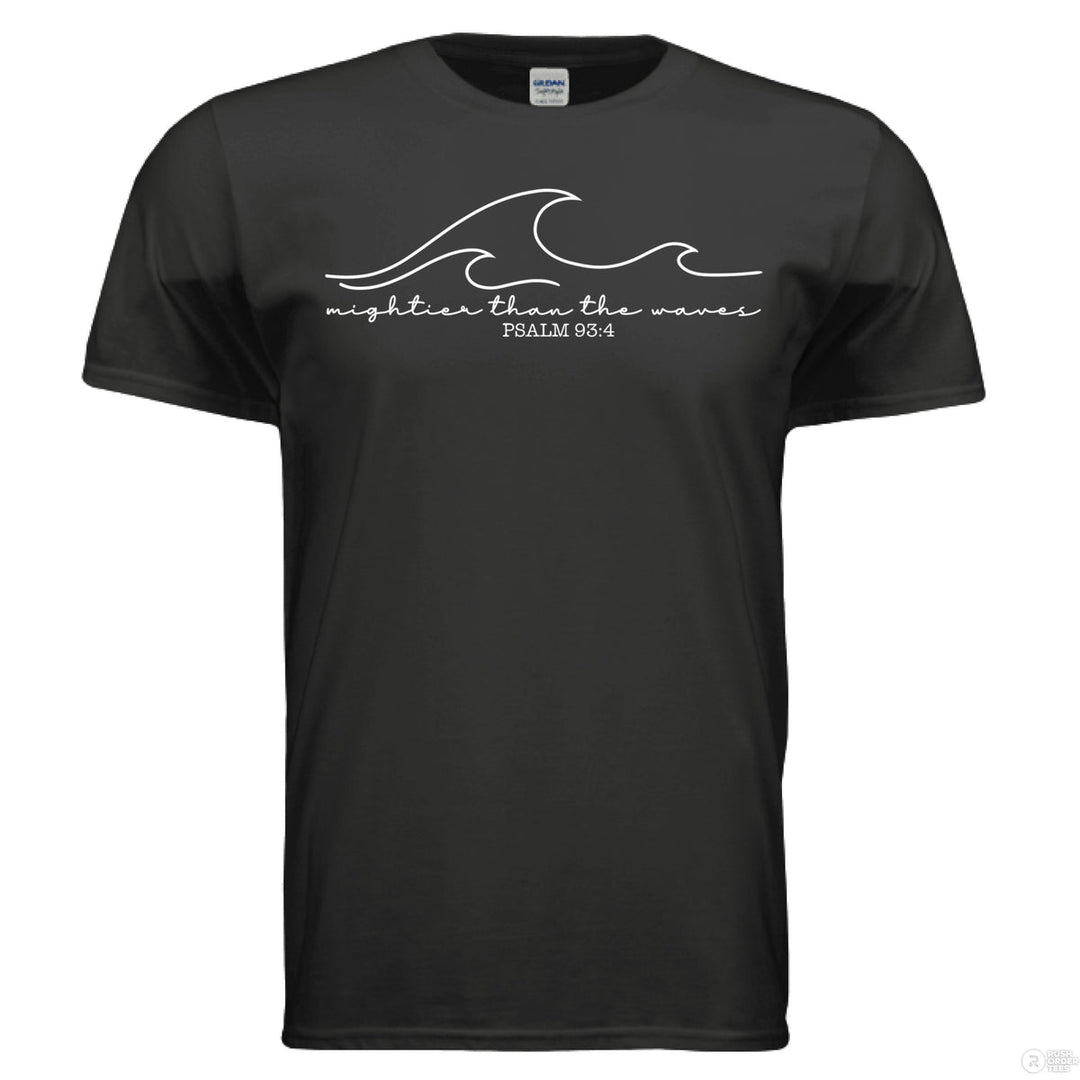Black shirt with minimalist white wave graphic and Psalm 93:4 verse reading “Mightier than the waves” in handwritten script.