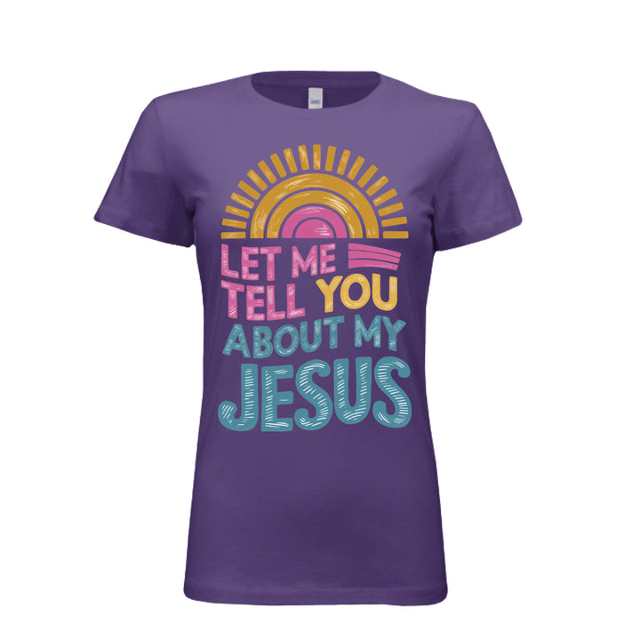 Women's fitted tee in purple with colorful retro sunrise design and bold text reading “Let Me Tell You About My Jesus.