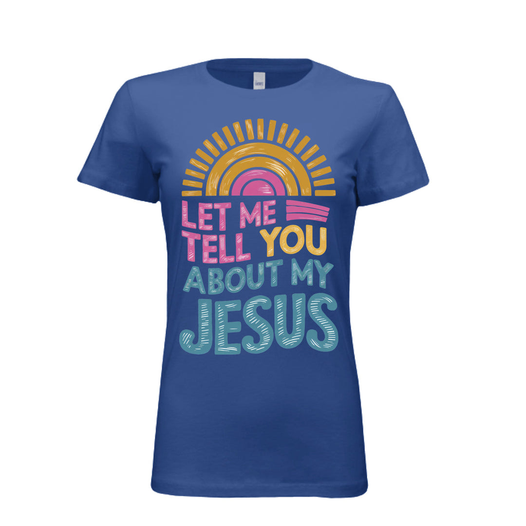 Women's fitted tee in true royal with colorful retro sunrise design and bold text reading “Let Me Tell You About My Jesus.