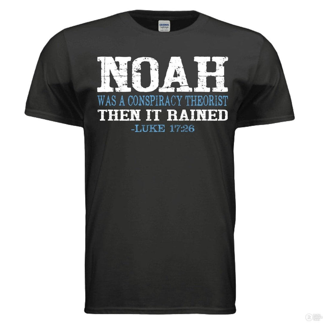 Black shirt with bold distressed text: “NOAH was a conspiracy theorist THEN IT RAINED – Luke 17:26” in white and blue, referencing biblical faith and truth.