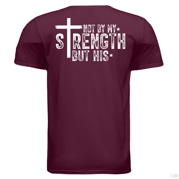 Maroon Christian t-shirt with bold white text reading ‘Not by my strength but His’ and a large cross forming the letter T in STRENGTH