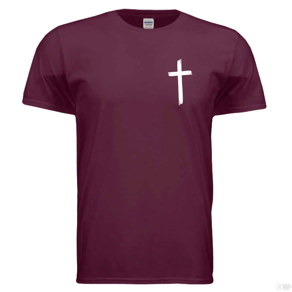 Maroon Christian t-shirt with bold white text reading ‘Not by my strength but His’ and a large cross forming the letter T in STRENGTH
