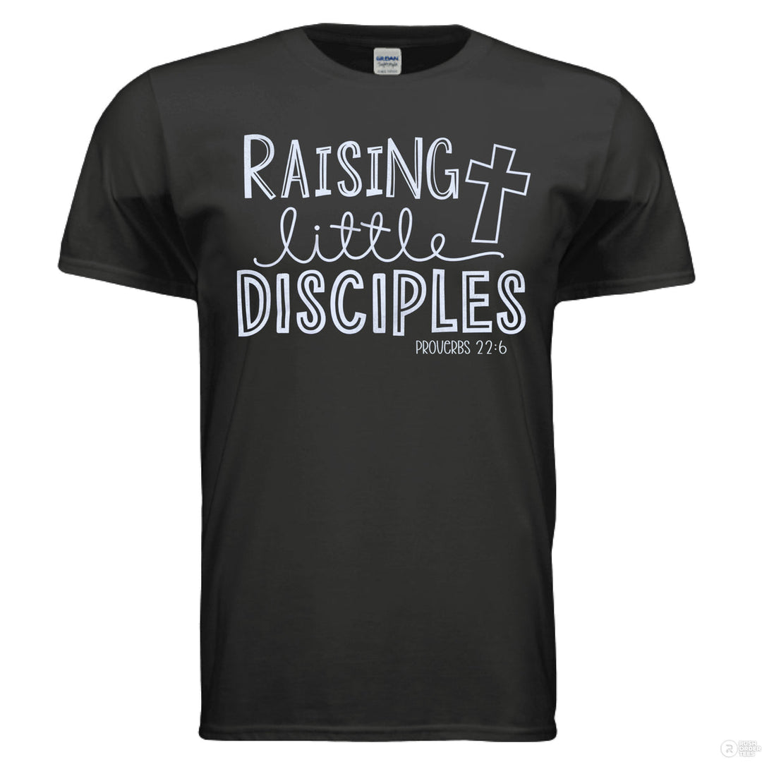 Black Christian t-shirt with playful white text reading ‘Raising little disciples’ and a cross design, featuring Proverbs 22:6