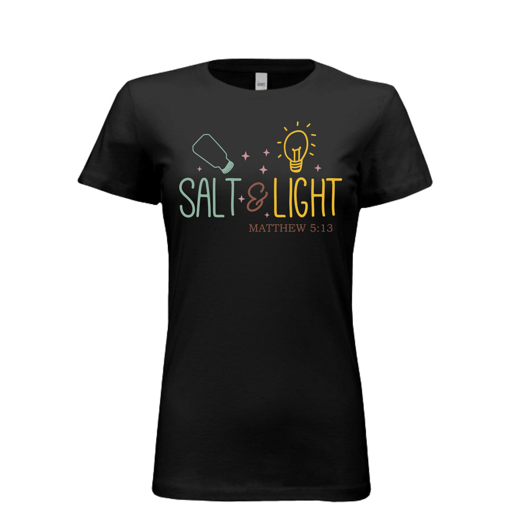 Black women’s fitted tee with pastel salt shaker, lightbulb, and “Salt & Light” Matthew 5:13 design in playful lettering with sparkles.