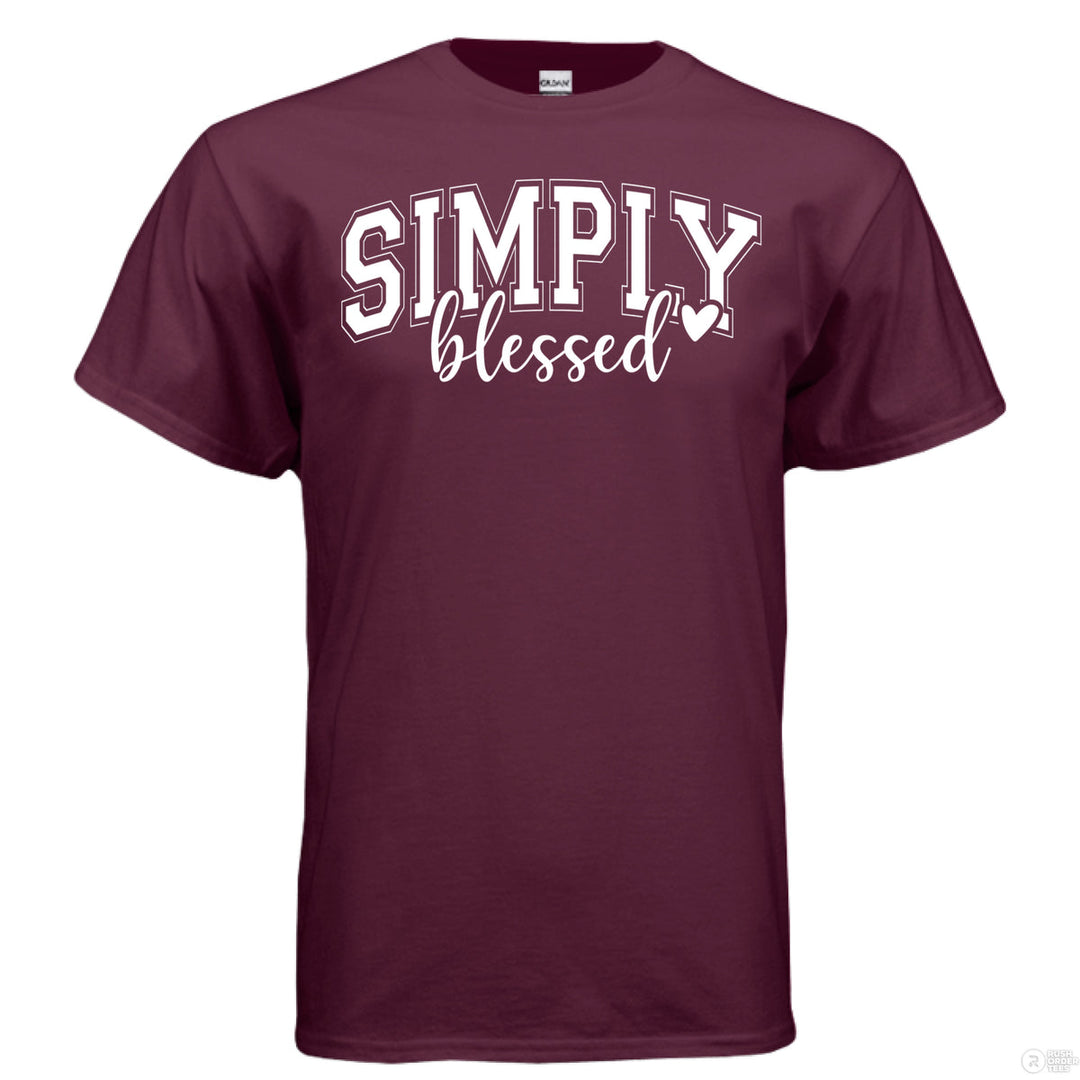 Maroon Christian t-shirt with bold white text reading ‘SIMPLY blessed’ in mixed fonts and a small heart accent